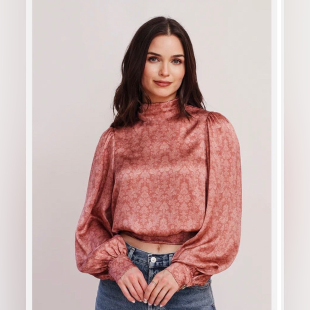Cami NYC long sleeve feminine blouse with high neck and puffed shoulders